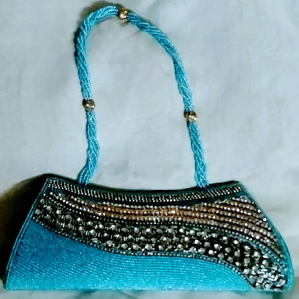 kimaya clutch with strap